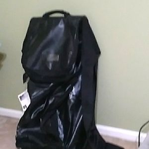 Wheeled The North Face black duffle bag. 3ft X 18inches.  Holds a ton of gear!